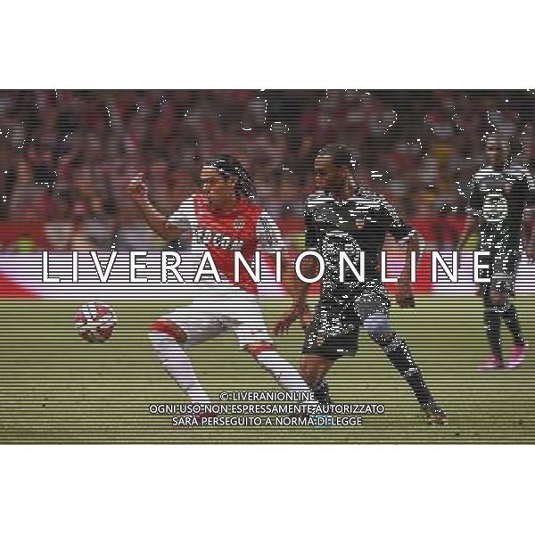 Radamel FALCAO / Raffidine ABDULLAH - 10.08.2014 - Monaco / Lorient - 1er journee de Ligue 1 Photo : Fred Porcu / Icon Sport AG ALDOL IVERANI SAS ONLY ITALY AG ALDO LIVERANI SAS ONLY ITALY