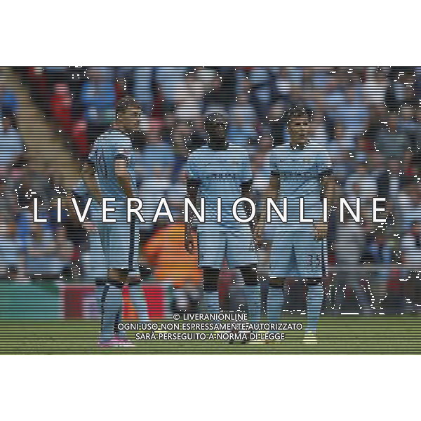 (140811) -- LONDON, Aug. 11, 2014 () -- (L to R) Manchester City\'s Edin Dzeko, Yaya Tour®¶ and Stevan Jovetic look dejected after Arsenal\'s Aaron Ramsey scoring their second goal during the Community Shield match between Arsenal and Manchester City at Wembley Stadium in London, Britain on Aug. 10, 2014. Manchester City lost 0-3. (/Wang Lili)(jyt) AG ALDO LIVERANI SAS ONLY ITALY