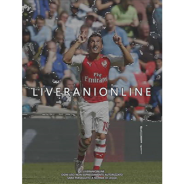 (140811) -- LONDON, Aug. 11, 2014 () -- Santi Cazorla of Arsenal celebrates scoring during the Community Shield match between Arsenal and Manchester City at Wembley Stadium in London, Britain on Aug. 10, 2014. Arsenal won 3-0. (/Wang Lili)(tjh) AG ALDO LIVERANI SAS ONLY ITALY
