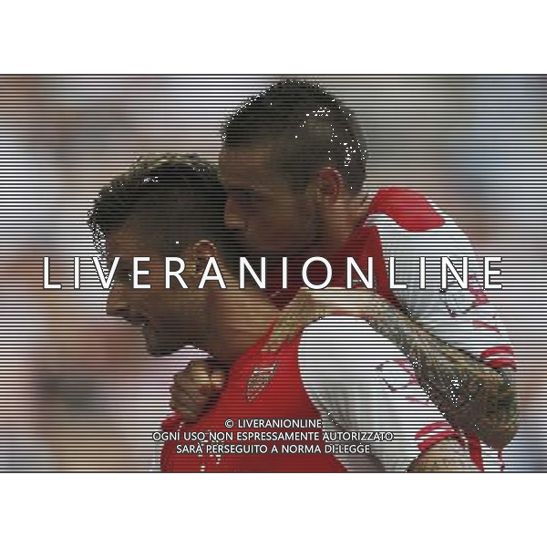 (140811) -- LONDON, Aug. 11, 2014 () -- Olivier Giroud (L) of Arsenal celebrates scoring with teammate Mathieu Debuchy during the Community Shield match between Arsenal and Manchester City at Wembley Stadium in London, Britain on Aug. 10, 2014. Arsenal won 3-0. (/Wang Lili)(tjh) AG ALDO LIVERANI SAS ONLY ITALY
