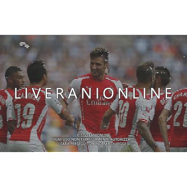 (140811) -- LONDON, Aug. 11, 2014 () -- Olivier Giroud (C) of Arsenal celebrates scoring with Santi Cazorla(2nd, L) during the Community Shield match between Arsenal and Manchester City at Wembley Stadium in London, Britain on Aug. 10, 2014. Arsenal won 3-0. (/Wang Lili)(tjh) AG ALDO LIVERANI SAS ONLY ITALY
