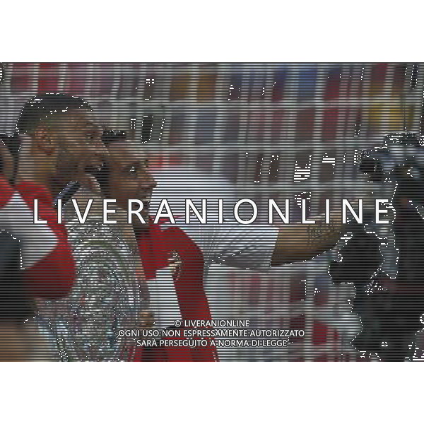 (140811) -- LONDON, Aug. 11, 2014 () -- Santi Cazorla (R) and Alex Oxlade-Chamberlain of Arsenal take a photo with a remote camera after the Community Shield match between Arsenal and Manchester City at Wembley Stadium in London, Britain on Aug. 10, 2014. Arsenal won 3-0. (/Wang Lili)(tjh) AG ALDO LIVERANI SAS ONLY ITALY