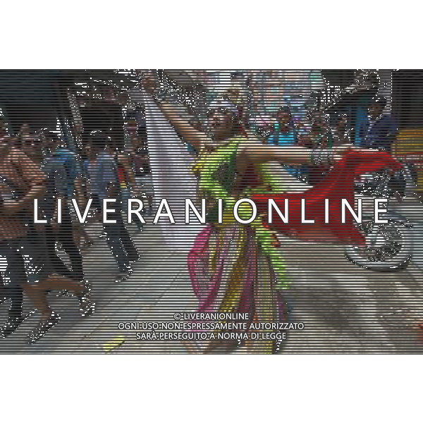 (140811) -- KATHMANDU, Aug. 11, 2014 (Xinhua) -- A reveler dances in a LGBT (lesbian, gay, bisexual and transgender) pride parade to mark the Gaijatra Festival, or the festival of cows, in Kathmandu, Nepal, Aug. 11, 2014. Hindus celebrated the festival to honour cows and commemorate loved ones who have been lost in the previous year. (Xinhua/Sunil Sharma) ****Authorized by ytfs**** ©PHOTOSHOT/Agenzia Aldo Liverani sas - ITALY ONLY - EDITORIAL USE ONLY