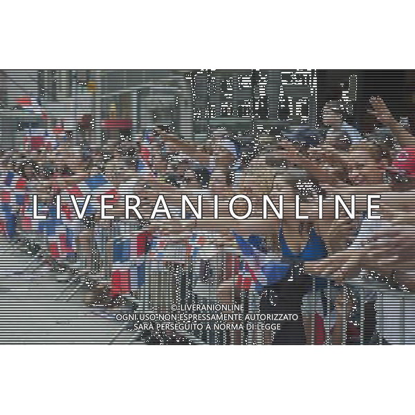 Thousands of Dominican-Americans and their friends and supporters march and view the 33rd Annual Dominican Day Parade in New York on Sixth Avenue on Sunday, August 10, 2014. Politicians, flags and cultural pride were on display at the annual event. Over 6o0,000 people identifying themselves as as Dominicans live in the New York area and with beautiful weather it seem like almost all of them were on Sixth Avenue. ©PHOTOSHOT/Agenzia Aldo Liverani sas - ITALY ONLY - EDITORIAL USE ONLY - 33ma parata annuale nella giornata domenicana a New York, sulla Sixth Avenue, 10 agosto 2014
