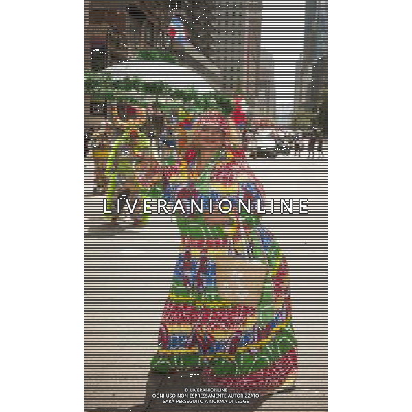 Costumed performer from Grupo Carnavelsco de Santiago en NJ in the 33rd Annual Dominican Day Parade in New York on Sixth Avenue on Sunday, August 10, 2014. Politicians, flags and cultural pride were on display at the annual event. Over 6o0,000 people identifying themselves as as Dominicans live in the New York area and with beautiful weather it seem like almost all of them were on Sixth Avenue. ©PHOTOSHOT/Agenzia Aldo Liverani sas - ITALY ONLY - EDITORIAL USE ONLY - 33ma parata annuale nella giornata domenicana a New York, sulla Sixth Avenue, 10 agosto 2014