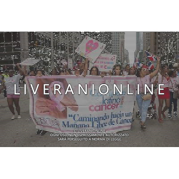 Members of the cancer care advocacy group Caminata Latina Contra El Cancer march the 33rd Annual Dominican Day Parade in New York on Sixth Avenue on Sunday, August 10, 2014. Politicians, flags and cultural pride were on display at the annual event. Over 6o0,000 people identifying themselves as as Dominicans live in the New York area and with beautiful weather it seem like almost all of them were on Sixth Avenue. ©PHOTOSHOT/Agenzia Aldo Liverani sas - ITALY ONLY - EDITORIAL USE ONLY - 33ma parata annuale nella giornata domenicana a New York, sulla Sixth Avenue, 10 agosto 2014