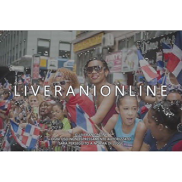 Thousands of Dominican-Americans and their friends and supporters march and view the 33rd Annual Dominican Day Parade in New York on Sixth Avenue on Sunday, August 10, 2014. Politicians, flags and cultural pride were on display at the annual event. Over 6o0,000 people identifying themselves as as Dominicans live in the New York area and with beautiful weather it seem like almost all of them were on Sixth Avenue. ©PHOTOSHOT/Agenzia Aldo Liverani sas - ITALY ONLY - EDITORIAL USE ONLY - 33ma parata annuale nella giornata domenicana a New York, sulla Sixth Avenue, 10 agosto 2014