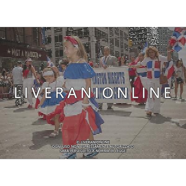 Costumed dancers march in the 33rd Annual Dominican Day Parade in New York on Sixth Avenue on Sunday, August 10, 2014. Politicians, flags and cultural pride were on display at the annual event. Over 6o0,000 people identifying themselves as as Dominicans live in the New York area and with beautiful weather it seem like almost all of them were on Sixth Avenue. ©PHOTOSHOT/Agenzia Aldo Liverani sas - ITALY ONLY - EDITORIAL USE ONLY - 33ma parata annuale nella giornata domenicana a New York, sulla Sixth Avenue, 10 agosto 2014