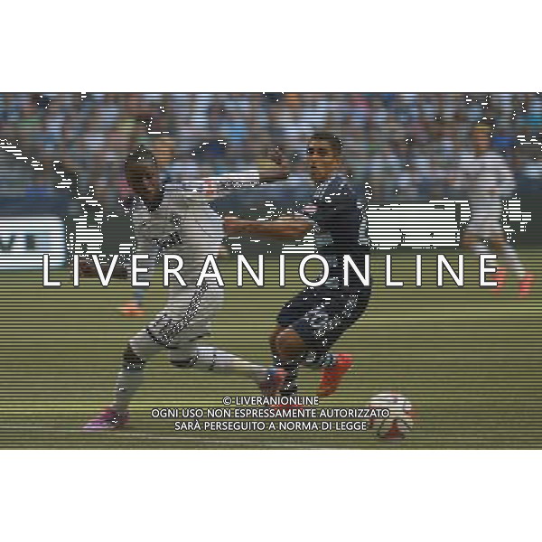 Sporting Kansas City\' Jorge Claros (R) vies with Vancouver Whitecaps\' Darren Mattocks during their MLS soccer game on Aug.10, 2014 at BC Place in Vancouver, Canada. Vancouver Whitecaps defeated Sporting KC 2-0. ©PHOTOSHOT/Agenzia Aldo Liverani sas - ITALY ONLY - EDITORIAL USE ONLY