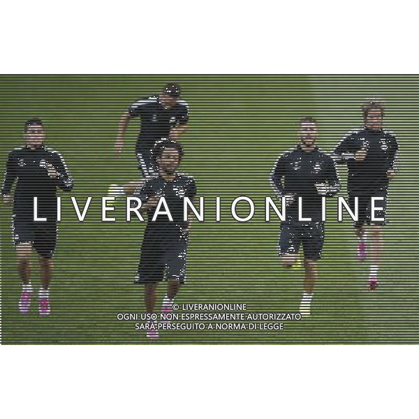 (140811) -- CARDIFF, May 18, 2014 () -- James Rodriguez, Marcelo, Ramos and Fabio Coentrao (front, from L to R) of Real Madrid take a training session for the UEFA Super Cup match between Real Madrid and Sevilla at Cardiff City Stadium in Cardiff, Britain on Aug. 11, 2014. (/Wang Lili) (ljr) ©PHOTOSHOT/Agenzia Aldo Liverani sas - ITALY ONLY - EDITORIAL USE ONLY - Sessione di allenamento del Real Madrid e Siviglia che disputeranno la partita di Supercoppa UEFA al Cardiff City Stadium, Gran Bretagna il 11 agosto 2014