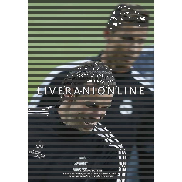 (140812) -- CARDIFF, Aug.12, 2014 () -- Gareth Bale(L) and Cristiano Ronaldo of Real Madrid take a training session for the UEFA Super Cup match between Real Madrid and Sevilla at Cardiff City Stadium in Cardiff, Britain on Aug. 11, 2014. (/Wang Lili) (ljr) ©PHOTOSHOT/Agenzia Aldo Liverani sas - ITALY ONLY - EDITORIAL USE ONLY - Sessione di allenamento del Real Madrid e Siviglia che disputeranno la partita di Supercoppa UEFA al Cardiff City Stadium, Gran Bretagna il 11 agosto 2014