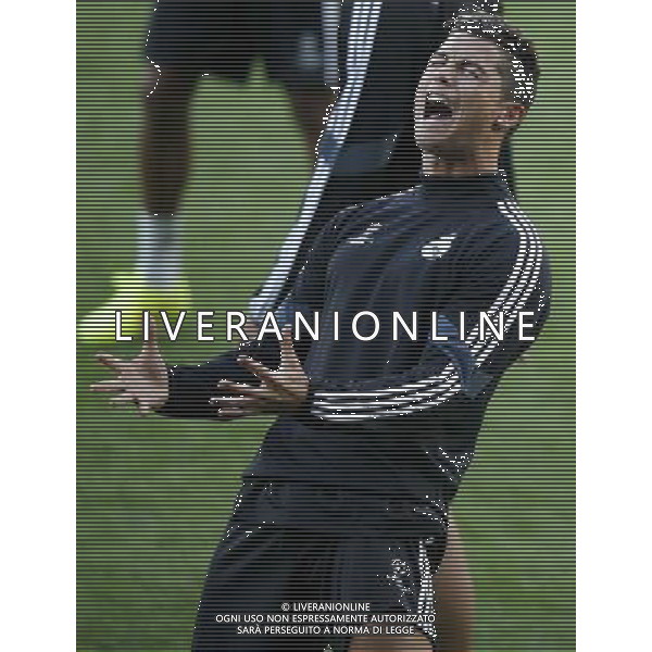 (140812) -- CARDIFF, Aug.12, 2014 () -- Cristiano Ronaldo of Real Madrid reacts during a training session for the UEFA Super Cup match between Real Madrid and Sevilla at Cardiff City Stadium in Cardiff, Britain on Aug. 11, 2014. (/Wang Lili) (ljr) ©PHOTOSHOT/Agenzia Aldo Liverani sas - ITALY ONLY - EDITORIAL USE ONLY - Sessione di allenamento del Real Madrid e Siviglia che disputeranno la partita di Supercoppa UEFA al Cardiff City Stadium, Gran Bretagna il 11 agosto 2014