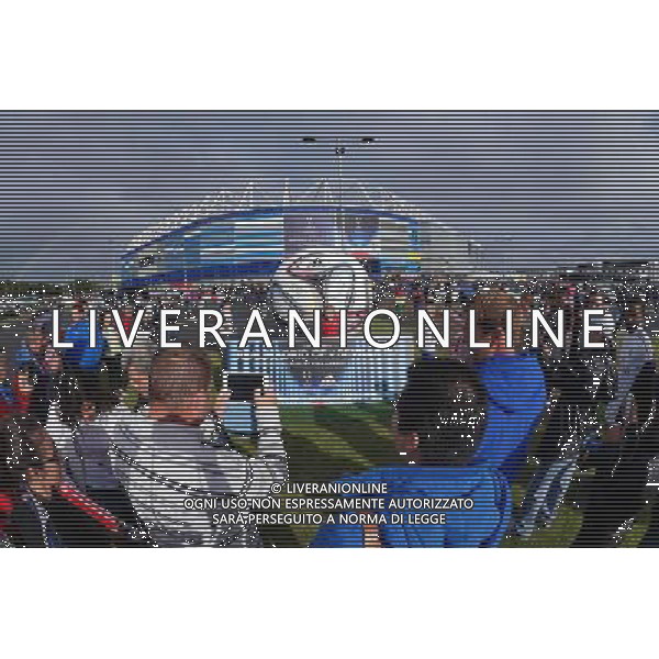 Fans enjoying the atmosphere outside the Cardiff City Stadium ahead of the Supercup clash between Real Madrid and Sevilla Photographer Ian Cook/CameraSport Football - UEFA Supercup - Real Madrid v Sevilla - Tuesday 12th August 2014 - Cardiff City Stadium - Cardiff © CameraSport - 43 Linden Ave. Countesthorpe. Leicester. England. LE8 5PG - Tel: +44 (0) 116 277 4147 - admin@camerasport.com - www.camerasport.com AG ALDO LIVERANI SAS ONLY ITALY