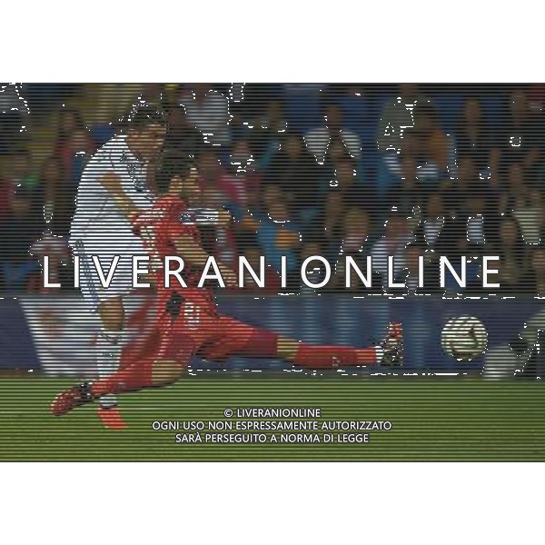 Real Madrid\'s Cristiano Ronaldo scores his sides second goal Photographer Ian Cook/CameraSport Football - UEFA Supercup - Real Madrid v Sevilla - Tuesday 12th August 2014 - Cardiff City Stadium - Cardiff © CameraSport - 43 Linden Ave. Countesthorpe. Leicester. England. LE8 5PG - Tel: +44 (0) 116 277 4147 - admin@camerasport.com - www.camerasport.com AG ALDO LIVERANI SAS ONLY ITALY