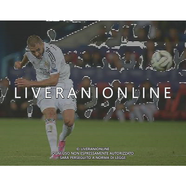 Real Madrid\'s Karim Benzema has a shot at goal Photographer Ian Cook/CameraSport Football - UEFA Supercup - Real Madrid v Sevilla - Tuesday 12th August 2014 - Cardiff City Stadium - Cardiff © CameraSport - 43 Linden Ave. Countesthorpe. Leicester. England. LE8 5PG - Tel: +44 (0) 116 277 4147 - admin@camerasport.com - www.camerasport.com AG ALDO LIVERANI SAS ONLY ITALY