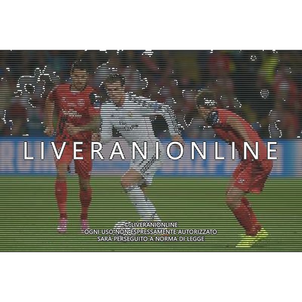 Real Madrid\'s Gareth Bale takes on Sevilla\'s Fernando Navarro Photographer Ian Cook/CameraSport Football - UEFA Supercup - Real Madrid v Sevilla - Tuesday 12th August 2014 - Cardiff City Stadium - Cardiff © CameraSport - 43 Linden Ave. Countesthorpe. Leicester. England. LE8 5PG - Tel: +44 (0) 116 277 4147 - admin@camerasport.com - www.camerasport.com AG ALDO LIVERANI SAS ONLY ITALY