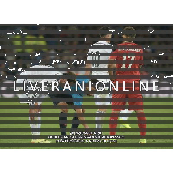 referee Mark Clattenburg uses the spray to mark the ball position for the free kick Photographer Ian Cook/CameraSport Football - UEFA Supercup - Real Madrid v Sevilla - Tuesday 12th August 2014 - Cardiff City Stadium - Cardiff © CameraSport - 43 Linden Ave. Countesthorpe. Leicester. England. LE8 5PG - Tel: +44 (0) 116 277 4147 - admin@camerasport.com - www.camerasport.com AG ALDO LIVERANI SAS ONLY ITALY