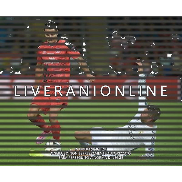 Real Madrid\'s Sergio Ramos slides in on Sevilla\'s Vitolo Photographer Ian Cook/CameraSport Football - UEFA Supercup - Real Madrid v Sevilla - Tuesday 12th August 2014 - Cardiff City Stadium - Cardiff © CameraSport - 43 Linden Ave. Countesthorpe. Leicester. England. LE8 5PG - Tel: +44 (0) 116 277 4147 - admin@camerasport.com - www.camerasport.com AG ALDO LIVERANI SAS ONLY ITALY