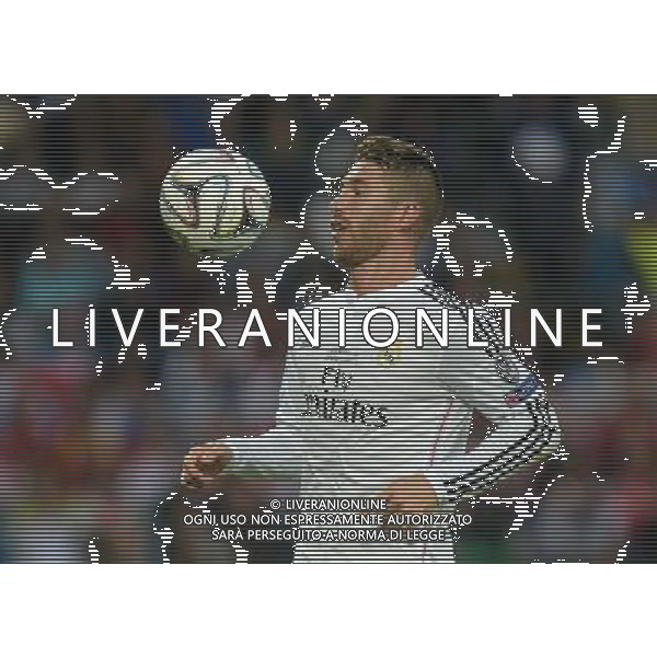 Real Madrid\'s Sergio Ramos in action during todays match Photographer Ian Cook/CameraSport Football - UEFA Supercup - Real Madrid v Sevilla - Tuesday 12th August 2014 - Cardiff City Stadium - Cardiff © CameraSport - 43 Linden Ave. Countesthorpe. Leicester. England. LE8 5PG - Tel: +44 (0) 116 277 4147 - admin@camerasport.com - www.camerasport.com AG ALDO LIVERANI SAS ONLY ITALY