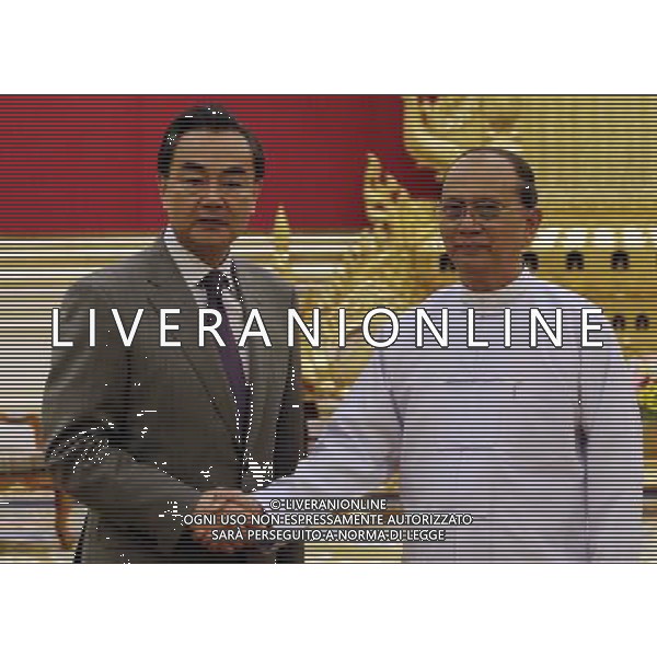 (140811) -- NAY PYI TAW, Aug. 11, 2014 (Xinhua) -- Myanmar President U Thein Sein (R) shakes hands with Chinese Foreign Minister Wang Yi in Nay Pyi Taw, Myanmar, Aug. 11, 2014. (Xinhua/U Aung) ****Authorized by ytfs**** ©PHOTOSHOT/Agenzia Aldo Liverani sas - ITALY ONLY - EDITORIAL USE ONLY - Il ministro degli Esteri cinese Wang Yi nella capitale del Myanmar di Nay Pyi Taw, 9 agosto 2014