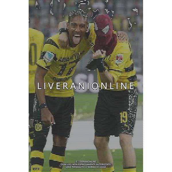 Fu§ball, firo : 13.08.2014 1.BL, 1.Bundesliga, Saison 2014/2015, Supercup, BVB, Borussia Dortmund, FC Bayern MŸnchen, Muenchen, Pierre-Emerick AUBAMEYANG, BVB Borussia Dortmund, Kevin GROSSKREUTZ GRO§KREUTZ, BVB Borussia Dortmund, Spidermanmaske, Humor, halbe Figur, Lachen, Humor, $worldrightsEs gelten unsere AGB, einsehbar auf www.firosportphoto.de, copyright by firo sportphoto: Coesfelder Str. 207 D-48249 DŸlmen www.firosportphoto.de mail@firosportphoto.de (V o l k s b a n k B o c h u m - W i t t e n ) BLZ.: 430 601 29 Kt. Nr.: 341 117 100 Tel:Ê +49-2594-9916004 Fax:Ê+49-2594-9916005 AG ALDO LIVERANI SAS ONLY ITALY