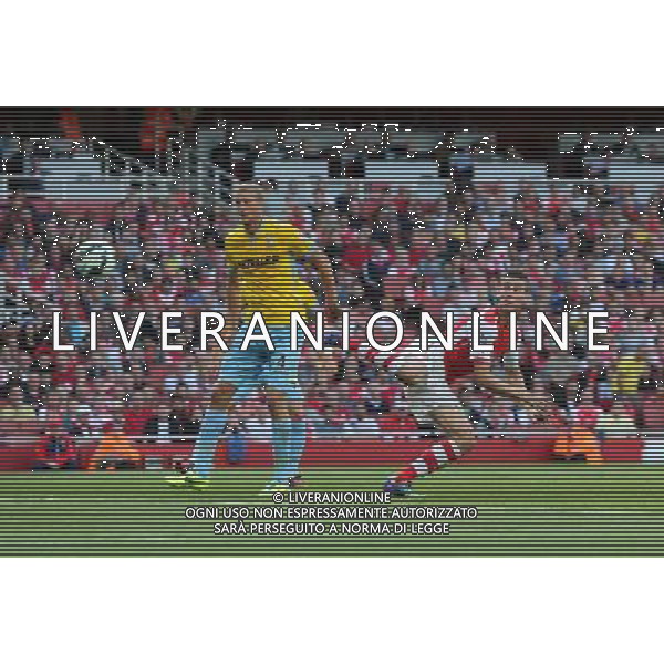 Arsenal\'s Laurent Koscielny scores Photographer Kieran Galvin/CameraSport Football - Barclays Premiership - Arsenal v Crystal Palace - Saturday 16th August 2014 - The Emirates Stadium - London © CameraSport - 43 Linden Ave. Countesthorpe. Leicester. England. LE8 5PG - Tel: +44 (0) 116 277 4147 - admin@camerasport.com - www.camerasport.com AG ALDO LIVERANI SAS ONLY ITALY