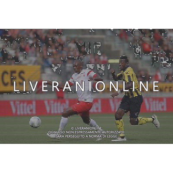 Joel SAMI / Larsen TOURE - 15.08.2014 - Nancy / Arles Avignon - 3eme journee de Ligue 2 Photo : Fred Marvaux / Icon Sport AG ALDO LIVERANI SAS ONLY ITALY