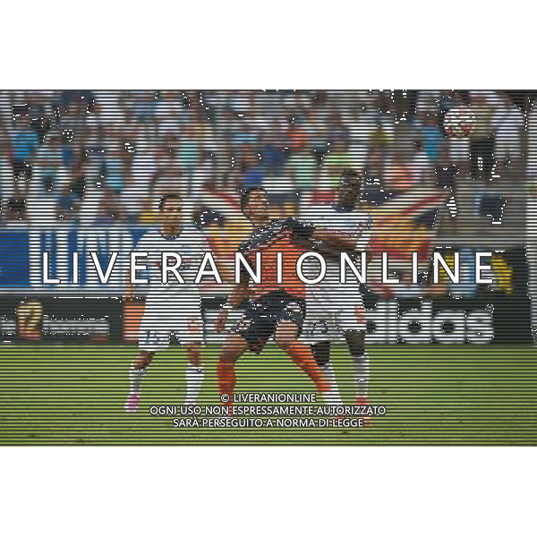 Lucas BARRIOS / Benjamin MENDY - 17.08.2014 - Marseille / Montpellier - 2eme journee de Ligue 1 Photo : Fred Porcu / Icon Sport AG ALDO LIVERANI SAS ONLY ITALY