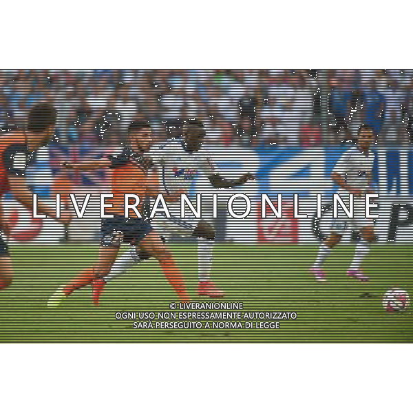 Morgan SAMSON / Benjamin MENDY - 17.08.2014 - Marseille / Montpellier - 2eme journee de Ligue 1 Photo : Fred Porcu / Icon Sport AG ALDO LIVERANI SAS ONLY ITALY