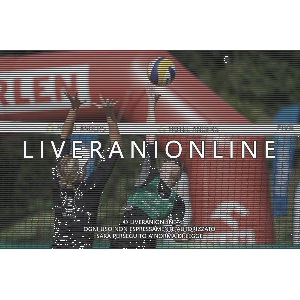 20.08.2014 - Stare Jablonki , siatkowka plazowa , beach volleyball , World Tour , FIVB Stare Jablonki Grand Slam 2014 , Czechy (zielone) - Szwecja (czarne) , Czech Republic (green) - Sweden (black) N/Z Tadva Yoken , Marketa Slukova Fot. Karol Bartnik / MPAimages.com/NEWSPIX.PL --- Newspix.pl /Agenzia Aldo Liverani sas - ITALY ONLY - Repubblica Ceca - Svezia beach volley FIVB Grande Slam 20.08.2014 *** Local Caption *** www.newspix.pl mail us: info@newspix.pl call us: 0048 022 23 22 222 --- Polish Picture Agency by Ringier Axel Springer Poland