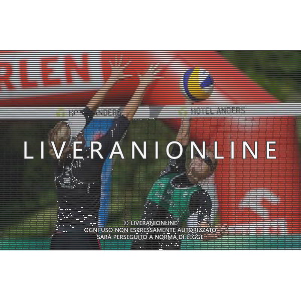 20.08.2014 - Stare Jablonki , siatkowka plazowa , beach volleyball , World Tour , FIVB Stare Jablonki Grand Slam 2014 , Czechy (zielone) - Szwecja (czarne) , Czech Republic (green) - Sweden (black) N/Z Tadva Yoken , Marketa Slukova Fot. Karol Bartnik / MPAimages.com/NEWSPIX.PL --- Newspix.pl /Agenzia Aldo Liverani sas - ITALY ONLY - Repubblica Ceca - Svezia beach volley FIVB Grande Slam 20.08.2014 *** Local Caption *** www.newspix.pl mail us: info@newspix.pl call us: 0048 022 23 22 222 --- Polish Picture Agency by Ringier Axel Springer Poland