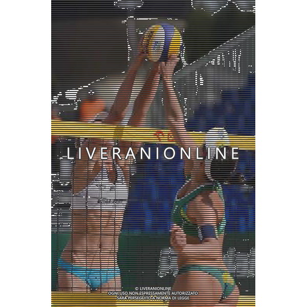 20.08.2014 - Stare Jablonki , siatkowka plazowa , beach volleyball , World Tour , FIVB Stare Jablonki Grand Slam 2014 , Brazylia (zielone) - Holandia (biale) , Brazil - Holland N/Z Jantine Van Der Vlist , Agatha Bednarczuk Fot. Mariusz Palczynski / MPAimages.com/NEWSPIX.PL --- Newspix.pl /Agenzia Aldo Liverani sas - ITALY ONLY - Brasile - Olanda beach volley, World Tour, FIVB Grande Slam 2014 *** Local Caption *** www.newspix.pl mail us: info@newspix.pl call us: 0048 022 23 22 222 --- Polish Picture Agency by Ringier Axel Springer Poland