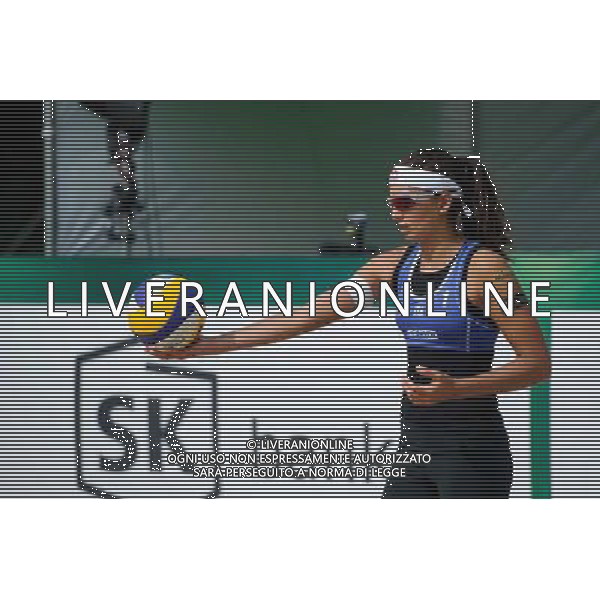 20.08.2014 - Stare Jablonki , siatkowka plazowa , beach volleyball , World Tour , FIVB Stare Jablonki Grand Slam 2014 , Wlochy (niebieskie) - Szwajcaria (zielone) , Italy (blue) - Switzerland (green) N/Z Marta Menegatti Fot. Karol Bartnik / MPAimages.com/NEWSPIX.PL --- Newspix.pl /Agenzia Aldo Liverani sas - ITALY ONLY - Italia - Svizzera beach volley, World Tour, FIVB Grande Slam 2014 *** Local Caption *** www.newspix.pl mail us: info@newspix.pl call us: 0048 022 23 22 222 --- Polish Picture Agency by Ringier Axel Springer Poland