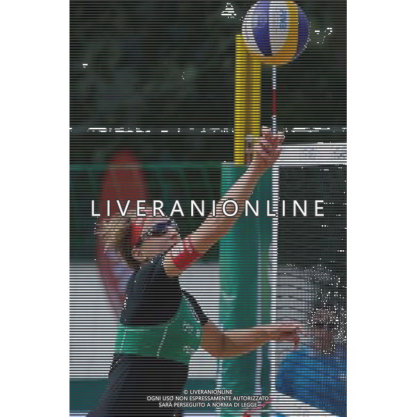 20.08.2014 - Stare Jablonki , siatkowka plazowa , beach volleyball , World Tour , FIVB Stare Jablonki Grand Slam 2014 , Wlochy (niebieskie) - Szwajcaria (zielone) , Italy (blue) - Switzerland (green) N/Z Tanja Goricanec Fot. Karol Bartnik / MPAimages.com/NEWSPIX.PL --- Newspix.pl /Agenzia Aldo Liverani sas - ITALY ONLY - Italia - Svizzera beach volley, World Tour, FIVB Grande Slam 2014 *** Local Caption *** www.newspix.pl mail us: info@newspix.pl call us: 0048 022 23 22 222 --- Polish Picture Agency by Ringier Axel Springer Poland