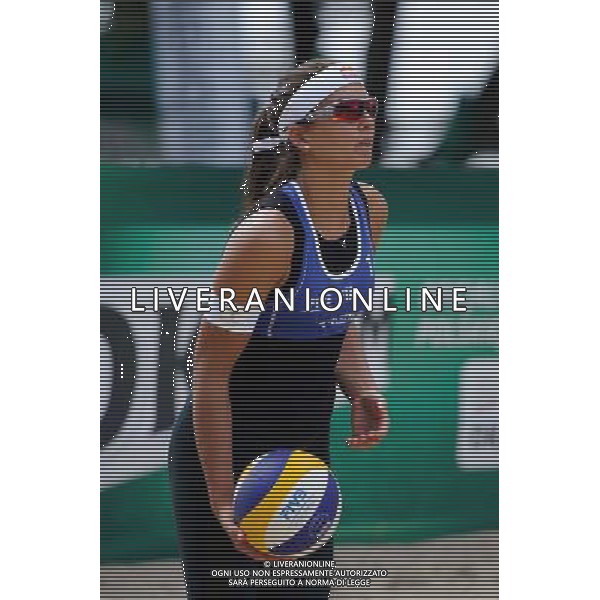 20.08.2014 - Stare Jablonki , siatkowka plazowa , beach volleyball , World Tour , FIVB Stare Jablonki Grand Slam 2014 , Wlochy (niebieskie) - Szwajcaria (zielone) , Italy (blue) - Switzerland (green) N/Z Marta Menegatti Fot. Karol Bartnik / MPAimages.com/NEWSPIX.PL --- Newspix.pl /Agenzia Aldo Liverani sas - ITALY ONLY - Italia - Svizzera beach volley, World Tour, FIVB Grande Slam 2014 *** Local Caption *** www.newspix.pl mail us: info@newspix.pl call us: 0048 022 23 22 222 --- Polish Picture Agency by Ringier Axel Springer Poland