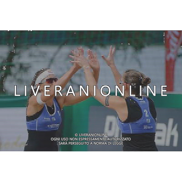 20.08.2014 - Stare Jablonki , siatkowka plazowa , beach volleyball , World Tour , FIVB Stare Jablonki Grand Slam 2014 , Wlochy (niebieskie) - Szwajcaria (zielone) , Italy (blue) - Switzerland (green) N/Z Marta Menegatti , Viktoria Orsi Toth Fot. Karol Bartnik / MPAimages.com/NEWSPIX.PL --- Newspix.pl /Agenzia Aldo Liverani sas - ITALY ONLY - Italia - Svizzera beach volley, World Tour, FIVB Grande Slam 2014 *** Local Caption *** www.newspix.pl mail us: info@newspix.pl call us: 0048 022 23 22 222 --- Polish Picture Agency by Ringier Axel Springer Poland
