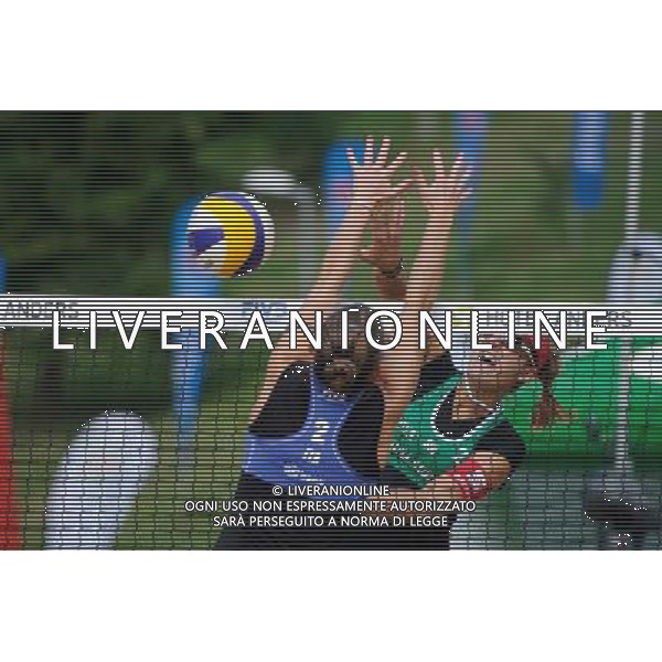 20.08.2014 - Stare Jablonki , siatkowka plazowa , beach volleyball , World Tour , FIVB Stare Jablonki Grand Slam 2014 , Wlochy (niebieskie) - Szwajcaria (zielone) , Italy (blue) - Switzerland (green) N/Z Viktoria Orsi Toth , Tanja Huberli Fot. Karol Bartnik / MPAimages.com/NEWSPIX.PL --- Newspix.pl /Agenzia Aldo Liverani sas - ITALY ONLY - Italia - Svizzera beach volley, World Tour, FIVB Grande Slam 2014 *** Local Caption *** www.newspix.pl mail us: info@newspix.pl call us: 0048 022 23 22 222 --- Polish Picture Agency by Ringier Axel Springer Poland
