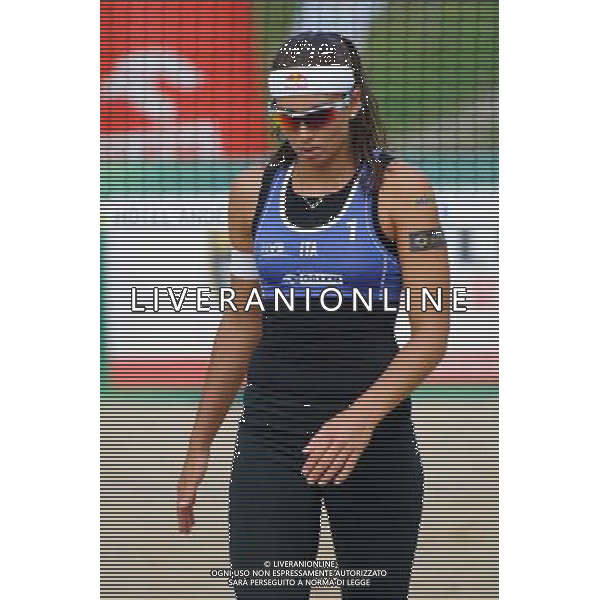 20.08.2014 - Stare Jablonki , siatkowka plazowa , beach volleyball , World Tour , FIVB Stare Jablonki Grand Slam 2014 , Wlochy (niebieskie) - Szwajcaria (zielone) , Italy (blue) - Switzerland (green) N/Z Marta Menegatti Fot. Karol Bartnik / MPAimages.com/NEWSPIX.PL --- Newspix.pl /Agenzia Aldo Liverani sas - ITALY ONLY - Italia - Svizzera beach volley, World Tour, FIVB Grande Slam 2014 *** Local Caption *** www.newspix.pl mail us: info@newspix.pl call us: 0048 022 23 22 222 --- Polish Picture Agency by Ringier Axel Springer Poland