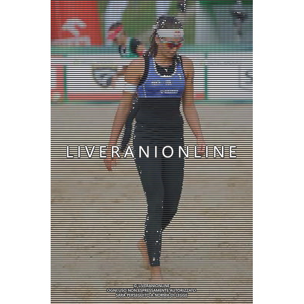20.08.2014 - Stare Jablonki , siatkowka plazowa , beach volleyball , World Tour , FIVB Stare Jablonki Grand Slam 2014 , Wlochy (niebieskie) - Szwajcaria (zielone) , Italy (blue) - Switzerland (green) N/Z Marta Menegatti Fot. Karol Bartnik / MPAimages.com/NEWSPIX.PL --- Newspix.pl /Agenzia Aldo Liverani sas - ITALY ONLY - Italia - Svizzera beach volley, World Tour, FIVB Grande Slam 2014 *** Local Caption *** www.newspix.pl mail us: info@newspix.pl call us: 0048 022 23 22 222 --- Polish Picture Agency by Ringier Axel Springer Poland