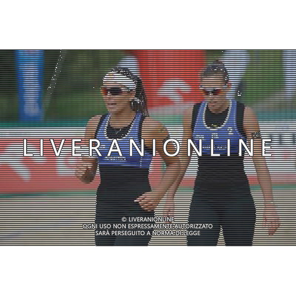 20.08.2014 - Stare Jablonki , siatkowka plazowa , beach volleyball , World Tour , FIVB Stare Jablonki Grand Slam 2014 , Wlochy (niebieskie) - Szwajcaria (zielone) , Italy (blue) - Switzerland (green) N/Z Marta Menegatti , Viktoria Orsi Toth Fot. Karol Bartnik / MPAimages.com/NEWSPIX.PL --- Newspix.pl /Agenzia Aldo Liverani sas - ITALY ONLY - Italia - Svizzera beach volley, World Tour, FIVB Grande Slam 2014 *** Local Caption *** www.newspix.pl mail us: info@newspix.pl call us: 0048 022 23 22 222 --- Polish Picture Agency by Ringier Axel Springer Poland