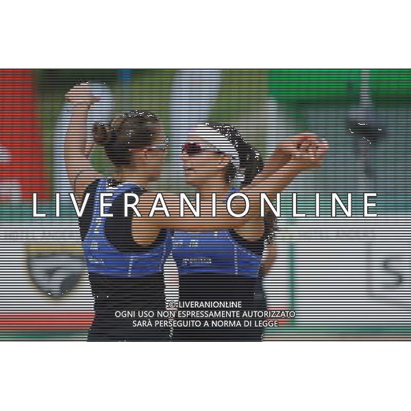 20.08.2014 - Stare Jablonki , siatkowka plazowa , beach volleyball , World Tour , FIVB Stare Jablonki Grand Slam 2014 , Wlochy (niebieskie) - Szwajcaria (zielone) , Italy (blue) - Switzerland (green) N/Z Viktoria Orsi Toth , Marta Menegatti Fot. Karol Bartnik / MPAimages.com/NEWSPIX.PL --- Newspix.pl /Agenzia Aldo Liverani sas - ITALY ONLY - Italia - Svizzera beach volley, World Tour, FIVB Grande Slam 2014 *** Local Caption *** www.newspix.pl mail us: info@newspix.pl call us: 0048 022 23 22 222 --- Polish Picture Agency by Ringier Axel Springer Poland