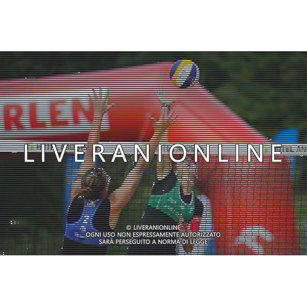 20.08.2014 - Stare Jablonki , siatkowka plazowa , beach volleyball , World Tour , FIVB Stare Jablonki Grand Slam 2014 , Wlochy (niebieskie) - Szwajcaria (zielone) , Italy (blue) - Switzerland (green) N/Z Viktoria Orsi Toth , Tanja Huberli Fot. Karol Bartnik / MPAimages.com/NEWSPIX.PL --- Newspix.pl /Agenzia Aldo Liverani sas - ITALY ONLY - Italia - Svizzera beach volley, World Tour, FIVB Grande Slam 2014 *** Local Caption *** www.newspix.pl mail us: info@newspix.pl call us: 0048 022 23 22 222 --- Polish Picture Agency by Ringier Axel Springer Poland