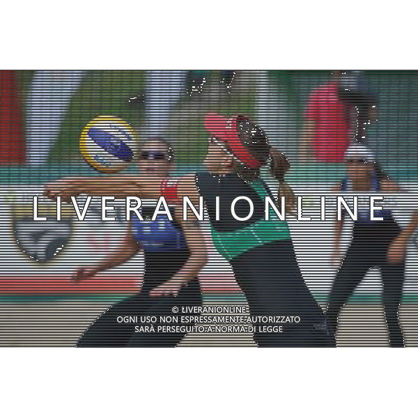 20.08.2014 - Stare Jablonki , siatkowka plazowa , beach volleyball , World Tour , FIVB Stare Jablonki Grand Slam 2014 , Wlochy (niebieskie) - Szwajcaria (zielone) , Italy (blue) - Switzerland (green) N/Z Tanja Huberli Fot. Karol Bartnik / MPAimages.com/NEWSPIX.PL --- Newspix.pl /Agenzia Aldo Liverani sas - ITALY ONLY - Italia - Svizzera beach volley, World Tour, FIVB Grande Slam 2014 *** Local Caption *** www.newspix.pl mail us: info@newspix.pl call us: 0048 022 23 22 222 --- Polish Picture Agency by Ringier Axel Springer Poland