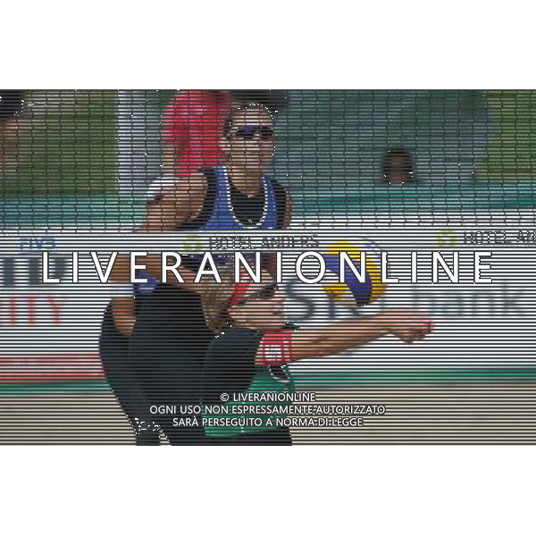 20.08.2014 - Stare Jablonki , siatkowka plazowa , beach volleyball , World Tour , FIVB Stare Jablonki Grand Slam 2014 , Wlochy (niebieskie) - Szwajcaria (zielone) , Italy (blue) - Switzerland (green) N/Z Viktoria Orsi Toth , Tanja Goricanec Fot. Karol Bartnik / MPAimages.com/NEWSPIX.PL --- Newspix.pl /Agenzia Aldo Liverani sas - ITALY ONLY - Italia - Svizzera beach volley, World Tour, FIVB Grande Slam 2014 *** Local Caption *** www.newspix.pl mail us: info@newspix.pl call us: 0048 022 23 22 222 --- Polish Picture Agency by Ringier Axel Springer Poland