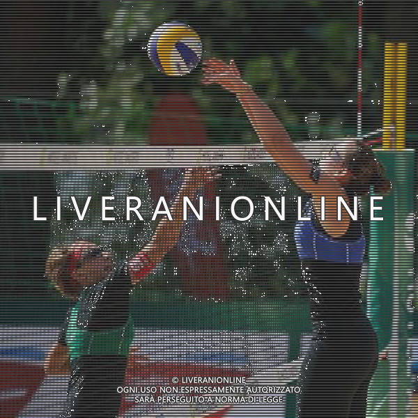20.08.2014 - Stare Jablonki , siatkowka plazowa , beach volleyball , World Tour , FIVB Stare Jablonki Grand Slam 2014 , Wlochy (niebieskie) - Szwajcaria (zielone) , Italy (blue) - Switzerland (green) N/Z Tanja Goricanec , Viktoria Orsi Toth Fot. Karol Bartnik / MPAimages.com/NEWSPIX.PL --- Newspix.pl /Agenzia Aldo Liverani sas - ITALY ONLY - Italia - Svizzera beach volley, World Tour, FIVB Grande Slam 2014 *** Local Caption *** www.newspix.pl mail us: info@newspix.pl call us: 0048 022 23 22 222 --- Polish Picture Agency by Ringier Axel Springer Poland
