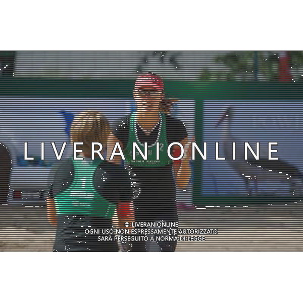 20.08.2014 - Stare Jablonki , siatkowka plazowa , beach volleyball , World Tour , FIVB Stare Jablonki Grand Slam 2014 , Wlochy (niebieskie) - Szwajcaria (zielone) , Italy (blue) - Switzerland (green) N/Z Tanja Huberli Fot. Karol Bartnik / MPAimages.com/NEWSPIX.PL --- Newspix.pl /Agenzia Aldo Liverani sas - ITALY ONLY - Italia - Svizzera beach volley, World Tour, FIVB Grande Slam 2014 *** Local Caption *** www.newspix.pl mail us: info@newspix.pl call us: 0048 022 23 22 222 --- Polish Picture Agency by Ringier Axel Springer Poland
