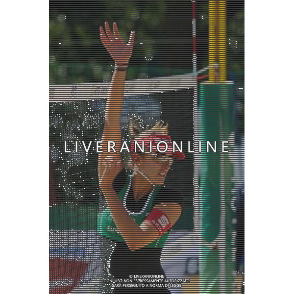 20.08.2014 - Stare Jablonki , siatkowka plazowa , beach volleyball , World Tour , FIVB Stare Jablonki Grand Slam 2014 , Wlochy (niebieskie) - Szwajcaria (zielone) , Italy (blue) - Switzerland (green) N/Z Tanja Huberli Fot. Karol Bartnik / MPAimages.com/NEWSPIX.PL --- Newspix.pl /Agenzia Aldo Liverani sas - ITALY ONLY - Italia - Svizzera beach volley, World Tour, FIVB Grande Slam 2014 *** Local Caption *** www.newspix.pl mail us: info@newspix.pl call us: 0048 022 23 22 222 --- Polish Picture Agency by Ringier Axel Springer Poland