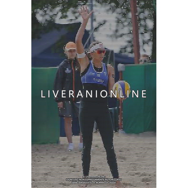 20.08.2014 - Stare Jablonki , siatkowka plazowa , beach volleyball , World Tour , FIVB Stare Jablonki Grand Slam 2014 , Wlochy (niebieskie) - Szwajcaria (zielone) , Italy (blue) - Switzerland (green) N/Z Marta Menegatti Fot. Karol Bartnik / MPAimages.com/NEWSPIX.PL --- Newspix.pl /Agenzia Aldo Liverani sas - ITALY ONLY - Italia - Svizzera beach volley, World Tour, FIVB Grande Slam 2014 *** Local Caption *** www.newspix.pl mail us: info@newspix.pl call us: 0048 022 23 22 222 --- Polish Picture Agency by Ringier Axel Springer Poland