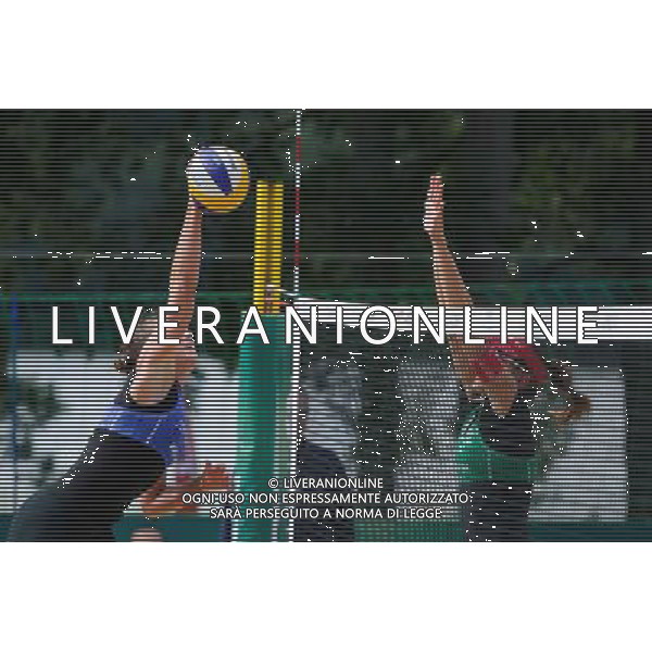 20.08.2014 - Stare Jablonki , siatkowka plazowa , beach volleyball , World Tour , FIVB Stare Jablonki Grand Slam 2014 , Wlochy (niebieskie) - Szwajcaria (zielone) , Italy (blue) - Switzerland (green) N/Z Viktoria Orsi Toth , Tanja Huberli Fot. Karol Bartnik / MPAimages.com/NEWSPIX.PL --- Newspix.pl /Agenzia Aldo Liverani sas - ITALY ONLY - Italia - Svizzera beach volley, World Tour, FIVB Grande Slam 2014 *** Local Caption *** www.newspix.pl mail us: info@newspix.pl call us: 0048 022 23 22 222 --- Polish Picture Agency by Ringier Axel Springer Poland