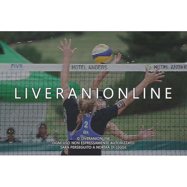 20.08.2014 - Stare Jablonki , siatkowka plazowa , beach volleyball , World Tour , FIVB Stare Jablonki Grand Slam 2014 , Niemcy (niebieski) -Kanada (bialy) , Germany (blue) - Canada (white) N/Z Britta Buthe Fot. Karol Bartnik / MPAimages.com/NEWSPIX.PL --- Newspix.pl /Agenzia Aldo Liverani sas - ITALY ONLY - Germania - Canada beach volley, World Tour, FIVB Grande Slam 2014 *** Local Caption *** www.newspix.pl mail us: info@newspix.pl call us: 0048 022 23 22 222 --- Polish Picture Agency by Ringier Axel Springer Poland